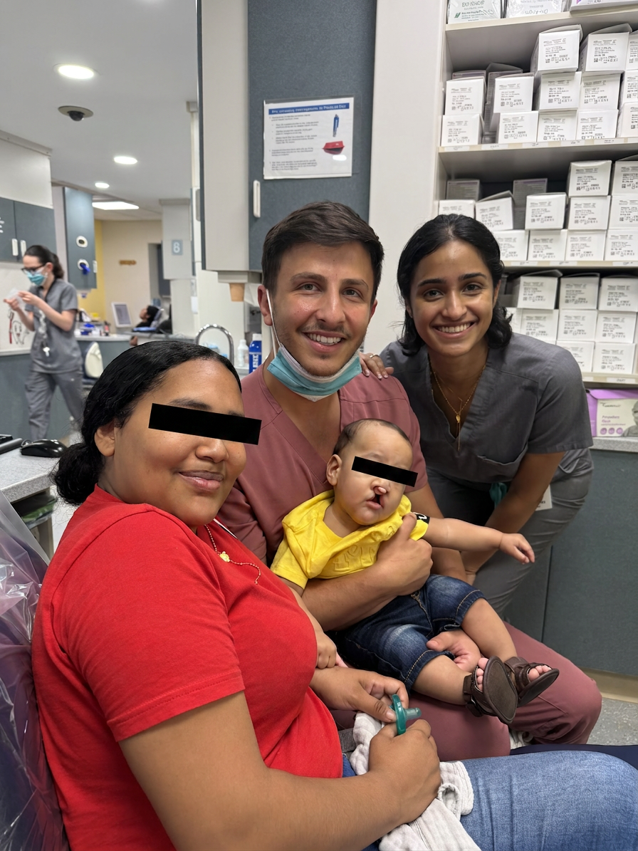 Dr. Shiloah with a cleft lip and palate patient and family