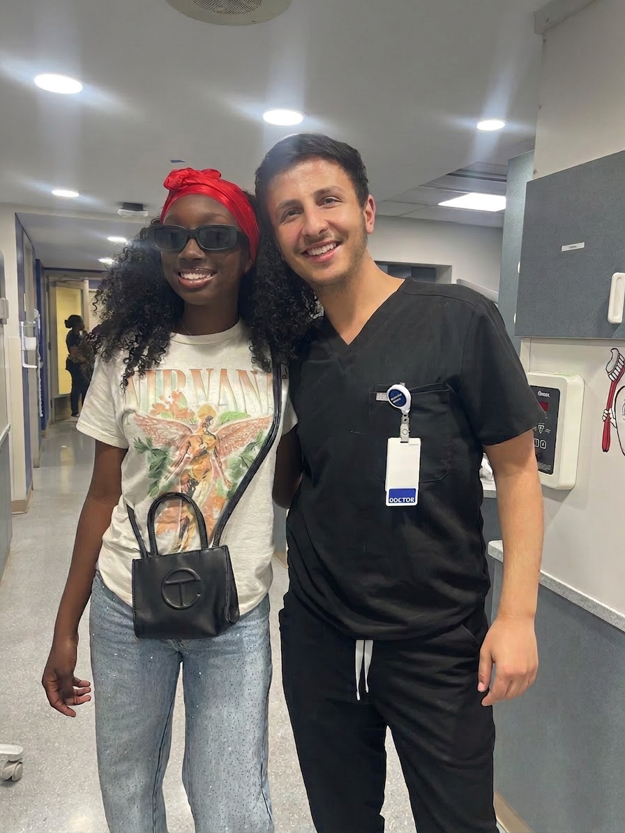 Dr. Shiloah with patients, moment 1