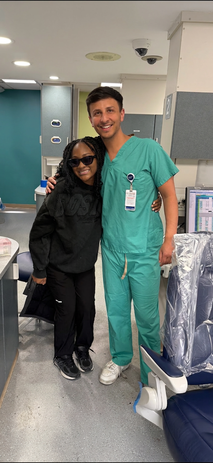 Dr. Shiloah with patients, moment 12