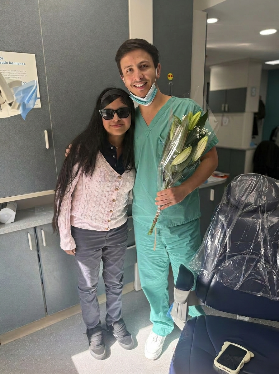 Dr. Shiloah with patients, moment 6