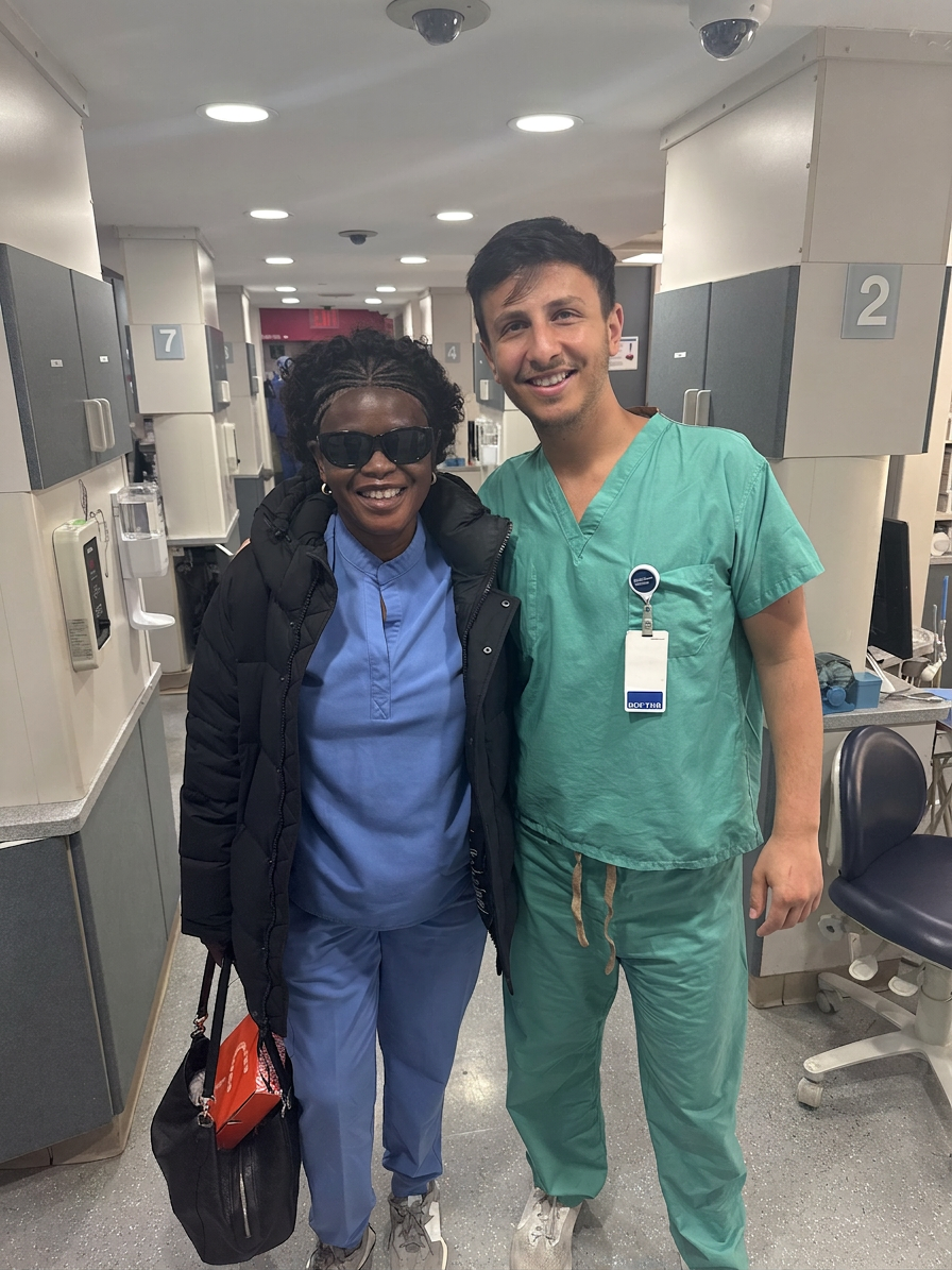 Dr. Shiloah with patients, moment 7