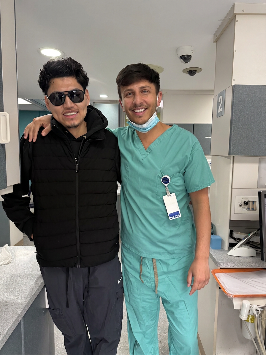Dr. Shiloah with patients, moment 9