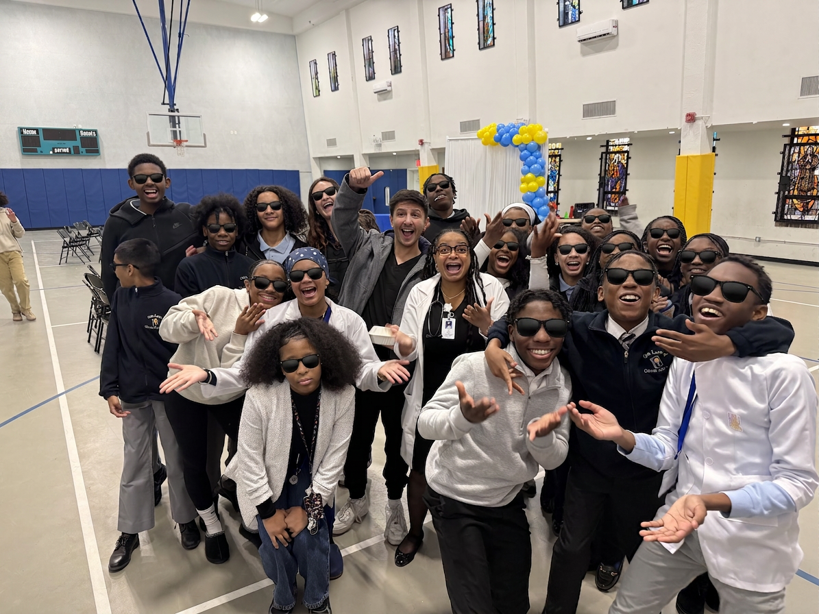 Dr. Shiloah with Bronx County students at career day — student identities protected